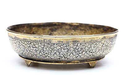 Lot 249 - A THAI GILDED SILVER SHALLOW FOOTED BOWL....