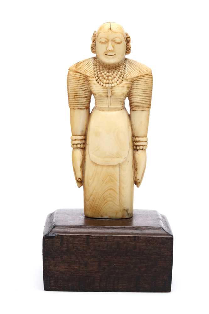 Lot 274 - A FINELY CARVED SRI LANKAN IVORY FIGURE OF A...