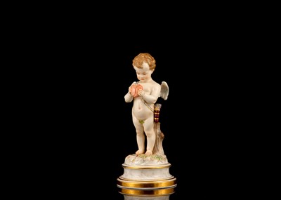 Lot 130 - A MEISSEN PORCELAIN FIGURE OF CUPID HOLDING A...