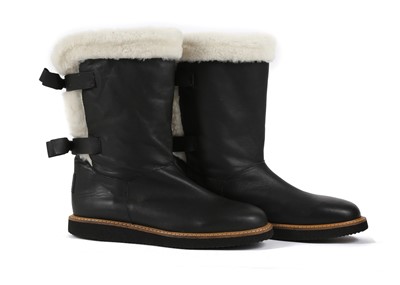 Lot 518 - RED Valentino black leather boots, shearling...