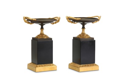 Lot 134 - A PAIR OF 19TH CENTURY GILT AND PATINATED...
