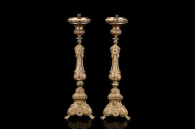 Lot 68 - A PAIR OF BAROQUE STYLE GILT BRASS TORCHERES ...