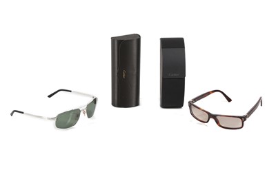 Lot 375 - Two pairs of men's Cartier sunglasses,...