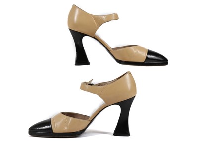 Lot 355 - Chanel two-tone shoes, 1990s, beige and black...