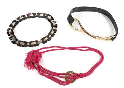 Lot 591 - Three designer belts, to include a black...