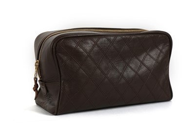 Lot 345 - Chanel brown quilted leather toiletry bag,...