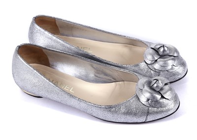 Lot 584 - Chanel silver leather Camellia ballet flats,...