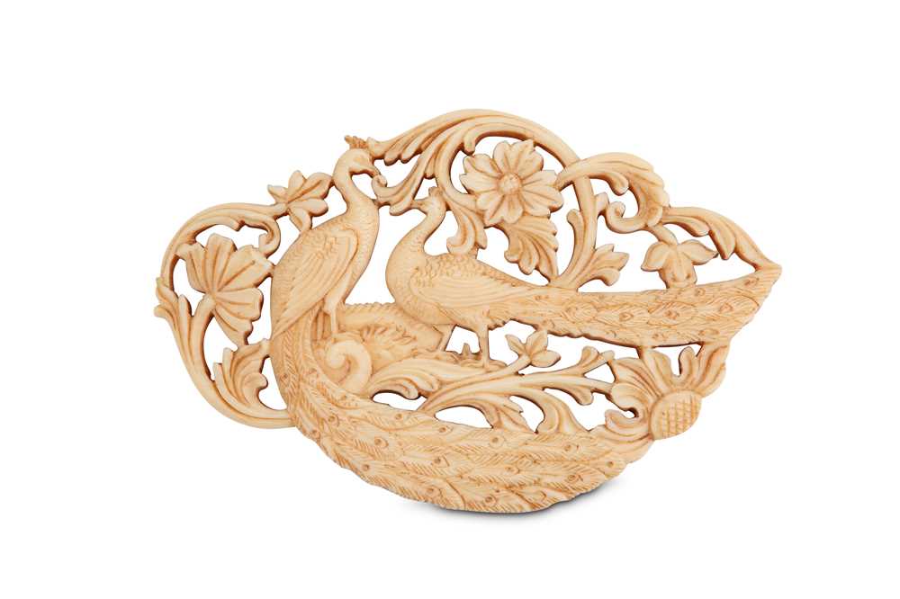 Lot 181 - A 19TH CENTURY INDIAN CARVED IVORY RELIEF OF...