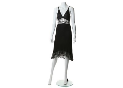 Lot 474 - Chanel black and lace dress, dated 2006, with...