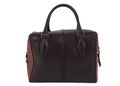 Lot 424 - Tod's Small D-Cube bowling bag, in contrasting...