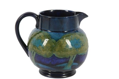 Lot 146A - A WILLIAM MOORCROFT 'MOONLIT BLUE' POTTERY JUG,...