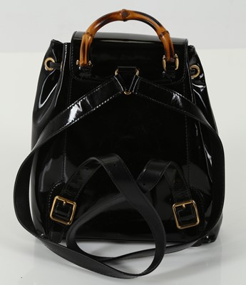 Lot 444 - Gucci black patent leather Bamboo Backpack PM,...