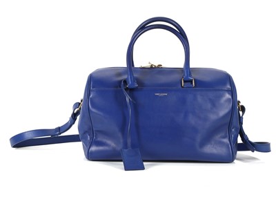 Lot 399 - Saint Laurent royal blue Duffle bag, c.2013,...