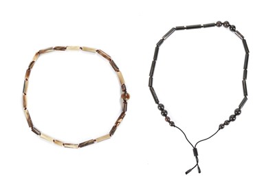 Lot 608 - Two Yves Saint Laurent horn bead necklaces,...