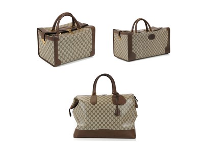 Lot 314 - Three monogram Gucci travel bags, 1990s, brown...