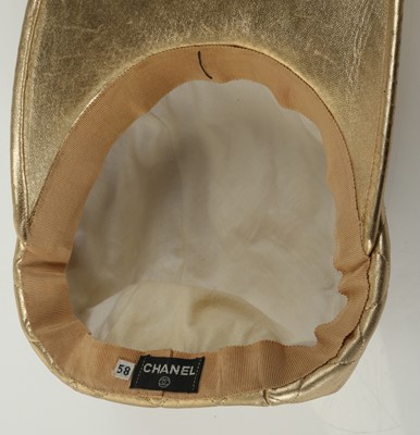 Lot 597 - Chanel Runway gold quilted baseball hat, 1991...