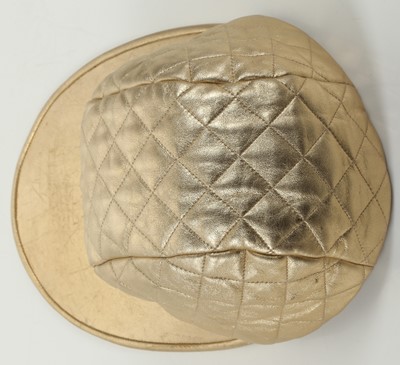 Lot 597 - Chanel Runway gold quilted baseball hat, 1991...