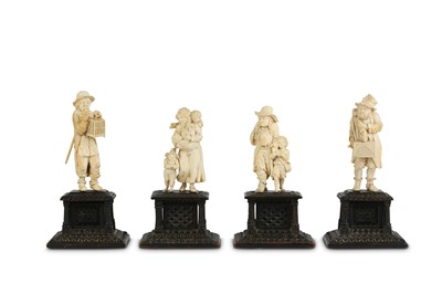 Lot 323 - A SET OF FOUR 19TH CENTURY GERMAN CARVED IVORY...