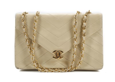 Lot 468 - Chanel cream quilted chevron leather flap bag,...