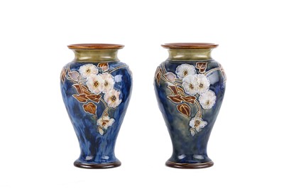 Lot 580 - A pair of Royal Doulton stoneware motto vases...