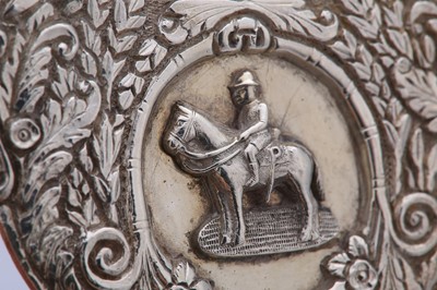 Lot 284 - A set of four Indian Colonial white metal menu...