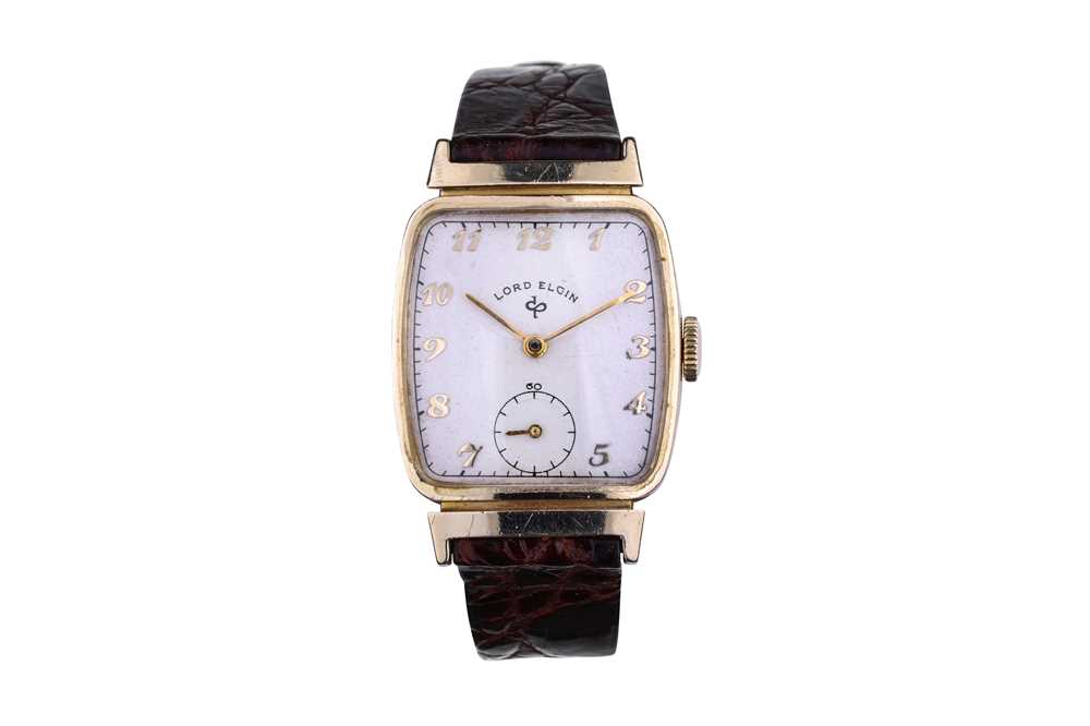 Lot 48 - LORD ELGIN. A 14K GOLD MANUAL WIND WRISTWATCH....
