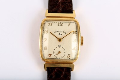Lot 48 - LORD ELGIN. A 14K GOLD MANUAL WIND WRISTWATCH....