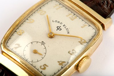 Lot 48 - LORD ELGIN. A 14K GOLD MANUAL WIND WRISTWATCH....