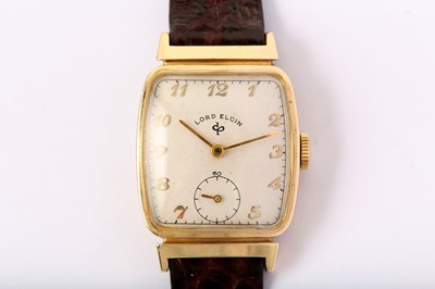 Lot 48 - LORD ELGIN. A 14K GOLD MANUAL WIND WRISTWATCH....