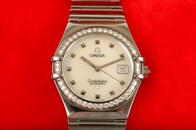 Lot 3 - OMEGA. A LADIES STAINLESS STEEL AND DIAMOND...