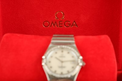 Lot 3 - OMEGA. A LADIES STAINLESS STEEL AND DIAMOND...