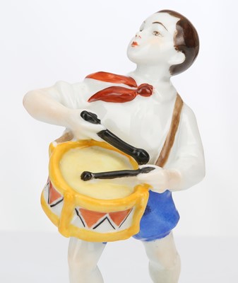 Lot 231 - A RARE RUSSIAN PORCELAIN FIGURE OF 'PIONEER...