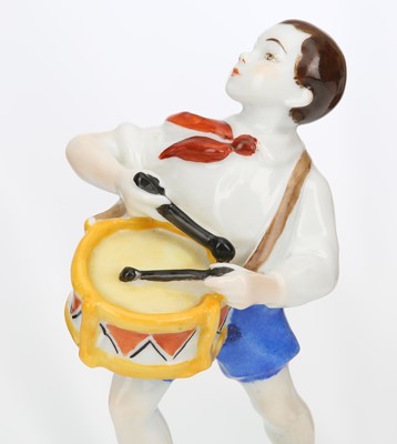 Lot 231 - A RARE RUSSIAN PORCELAIN FIGURE OF 'PIONEER...