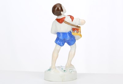 Lot 231 - A RARE RUSSIAN PORCELAIN FIGURE OF 'PIONEER...