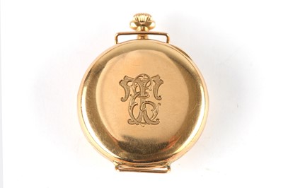 Lot 50 - A 14K YELLOW GOLD TRANSITIONAL FOB/WRISTWATCH....