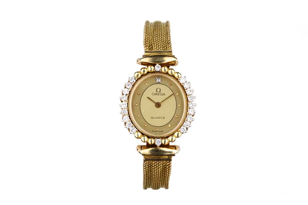 Lot 59 - OMEGA. AN 18K GOLD AND DIAMOND SET QUARTZ...