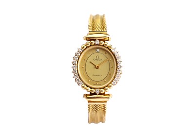 Lot 59 - OMEGA. AN 18K GOLD AND DIAMOND SET QUARTZ...