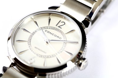 Lot 76 - CONCORD. A LADIES STAINLESS STEEL QUARTZ...