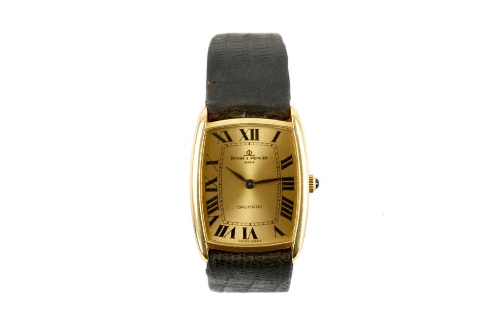 Lot 81 - BAUME & MERCIER. AN 18K GOLD AUTOMATIC...