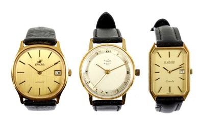 Lot 84 - THREE GENTS GOLD PLATED WRISTWATCHES. A...