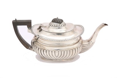 Lot 303 - A George V antique sterling silver teapot,...