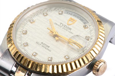 Lot 86 - TUDOR. A STAINLESS STEEL AND GOLD PLATED...
