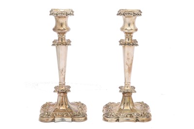 Lot 236 - A pair of late Victorian silver candlesticks,...