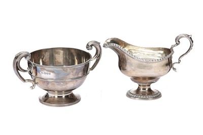 Lot 274a - A George V antique sterling silver sauceboat...