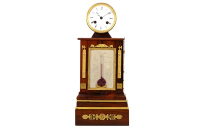 Lot 347 - A FRENCH ROSEWOOD AND GILT BRONZE MOUNTED...