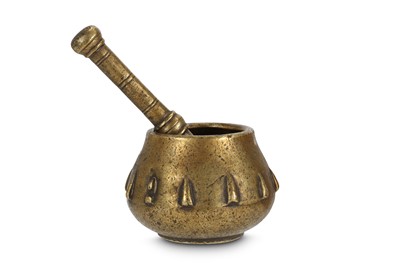 Lot 238 - A BRASS MORTAR AND PESTLE Northern India, 18th...