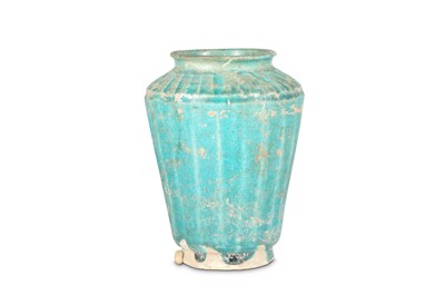 Lot 13 - A TURQUOISE-GLAZED POTTERY VASE Iran, 12th -...