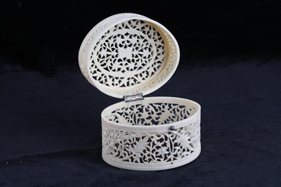 Lot 220 - A CARVED AND PIERCED IVORY BOX India, late...