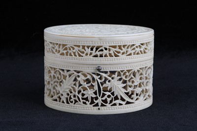 Lot 220 - A CARVED AND PIERCED IVORY BOX India, late...