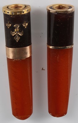 Lot 203 - Two Edwardian amber/silver and gold cigar...